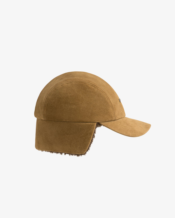 Tan suede Shearling Earflap Hat with earflaps and a fleece lining.