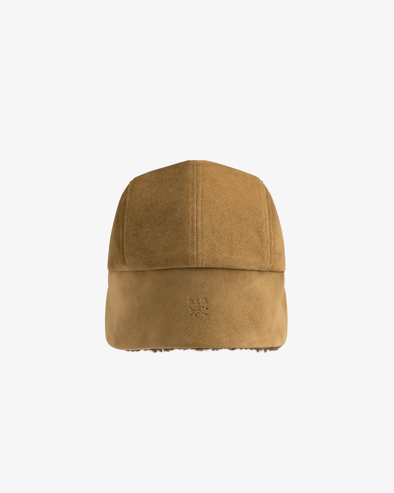 Brown suede Shearling Earflap Hat with earflaps and a small embossed logo on the side.
