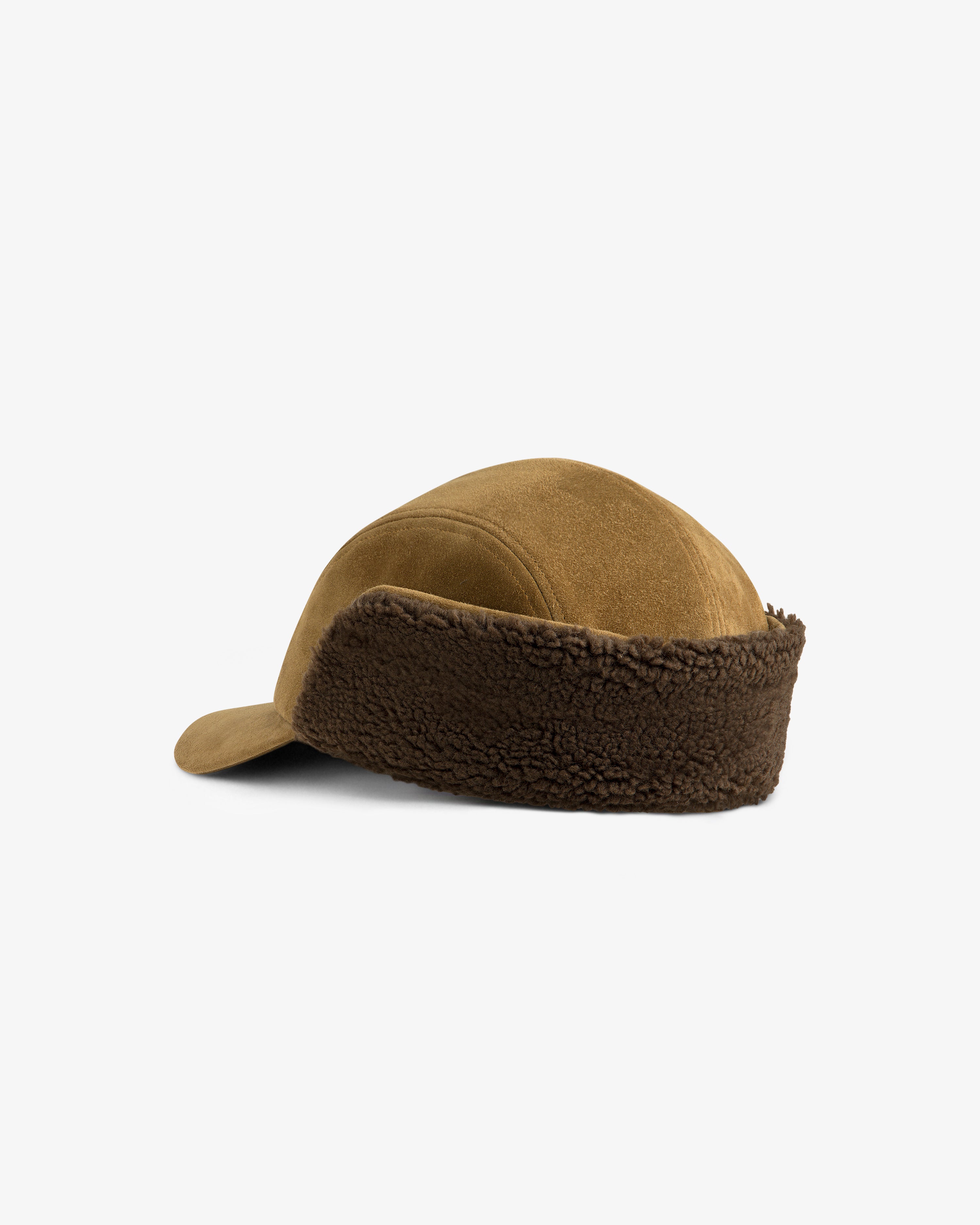 Brown Shearling Earflap Hat with a curved brim and a thick, textured fleece lining around the back and sides.