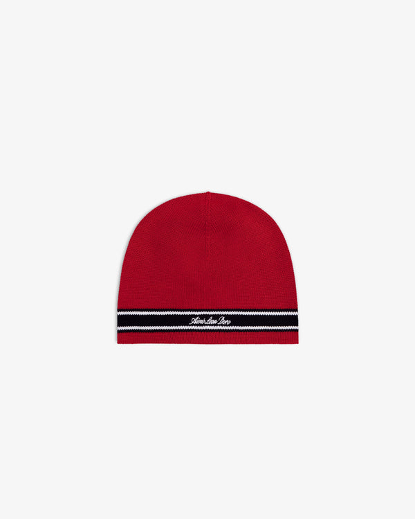 Stripe Knit Beanie: Red with black and white stripes near brim, white script text on front.