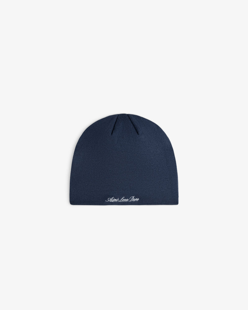 Navy blue ALD / New Era Dodgers Beanie with white embroidered script text at the hem.