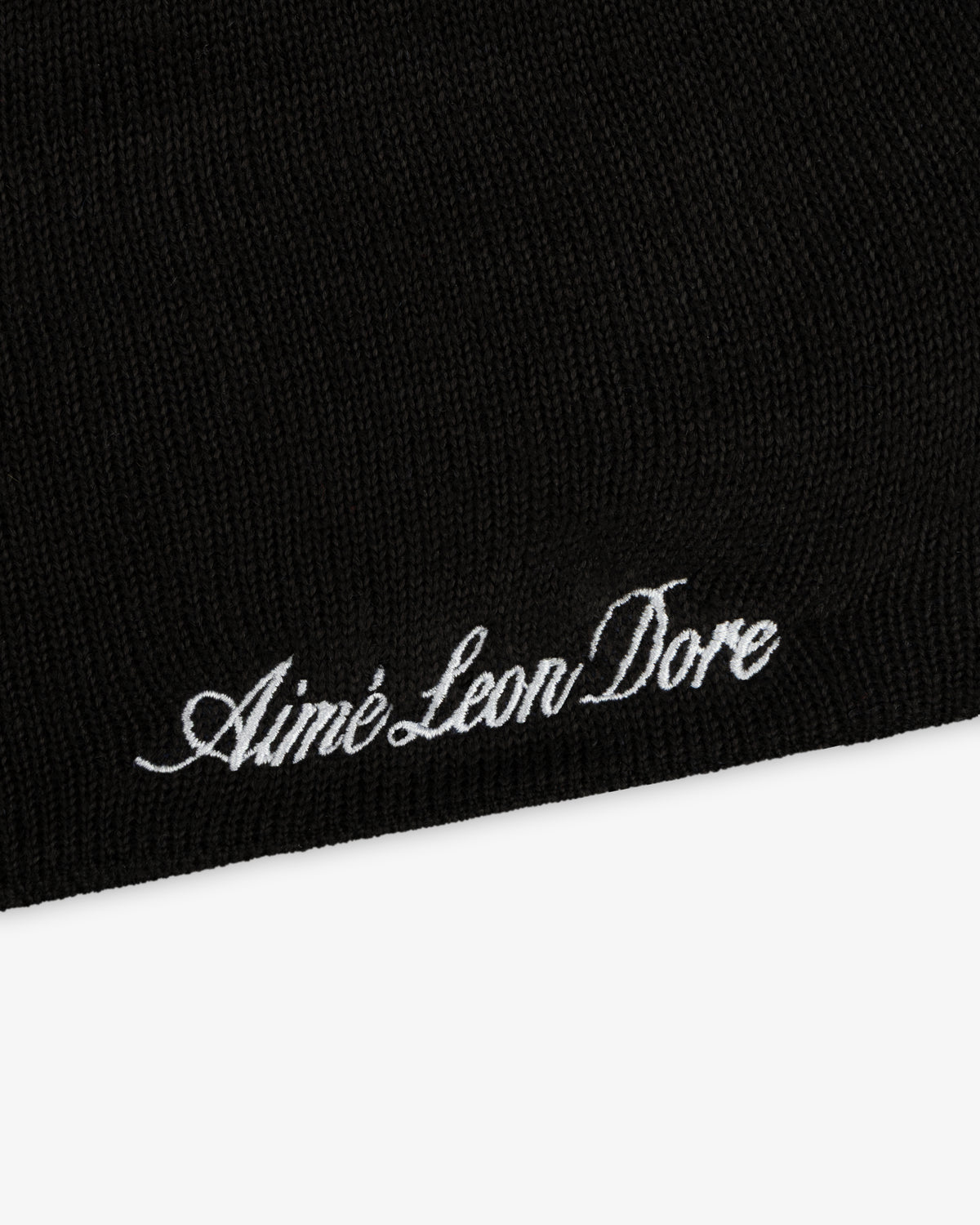 ALD / New Era Mets Beanie, a black knit beanie with white embroidered script text.