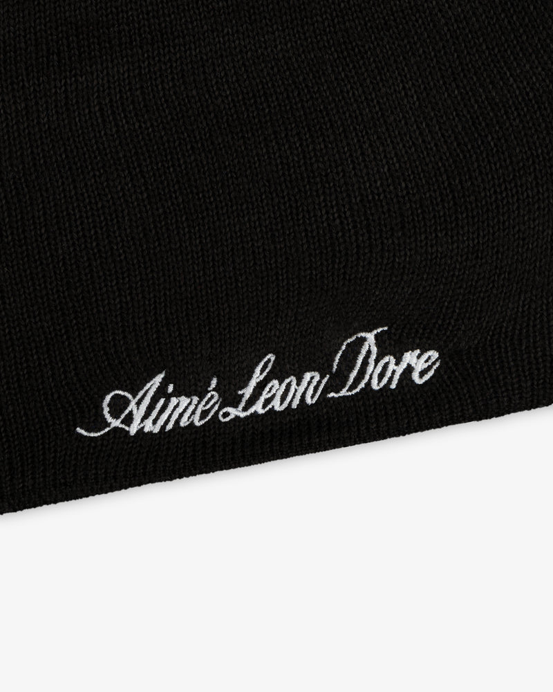 ALD / New Era Mets Beanie, a black knit beanie with white embroidered script text.