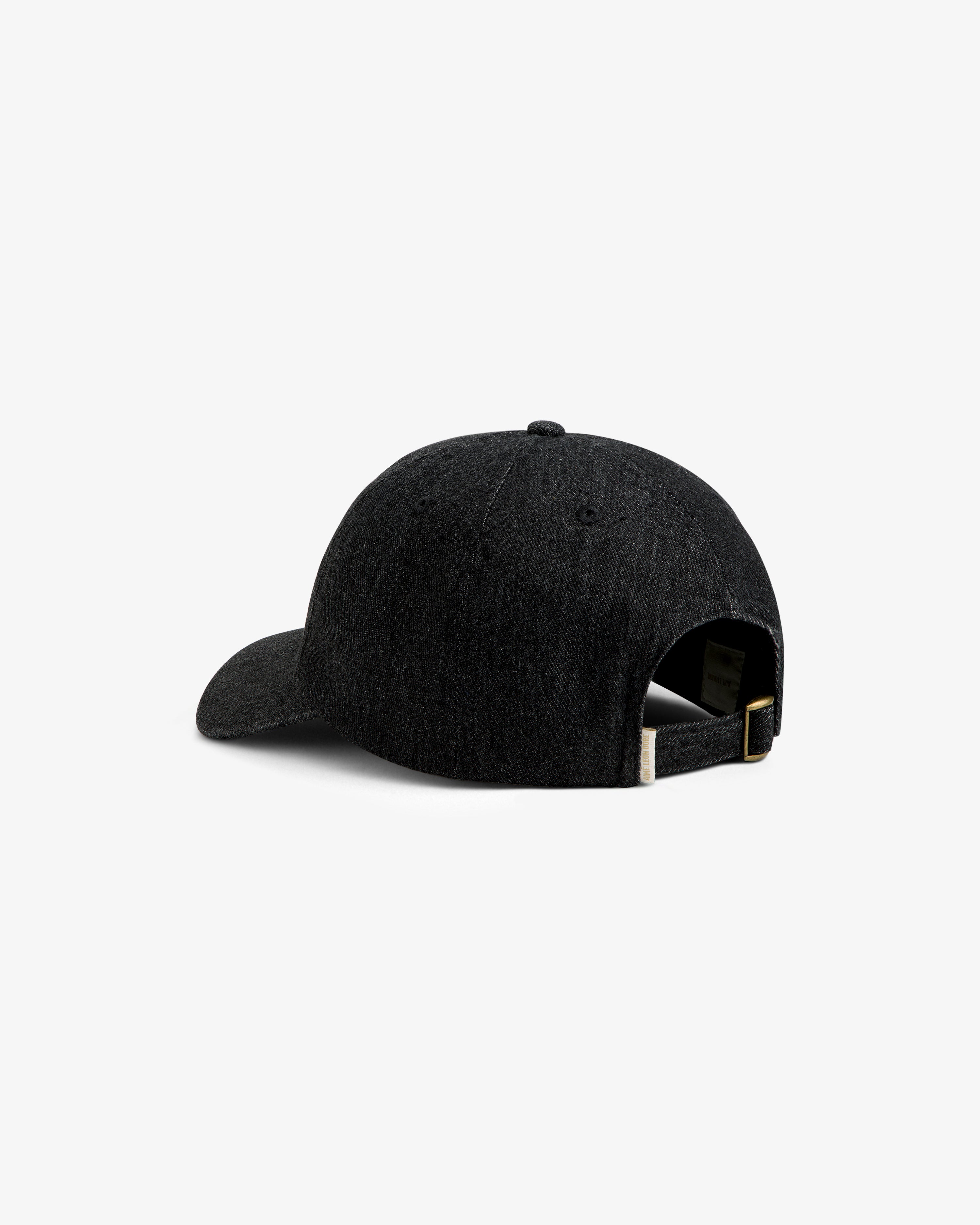 Back view of the dark grey Aimé Retriever Hat, featuring an adjustable brass buckle strap.