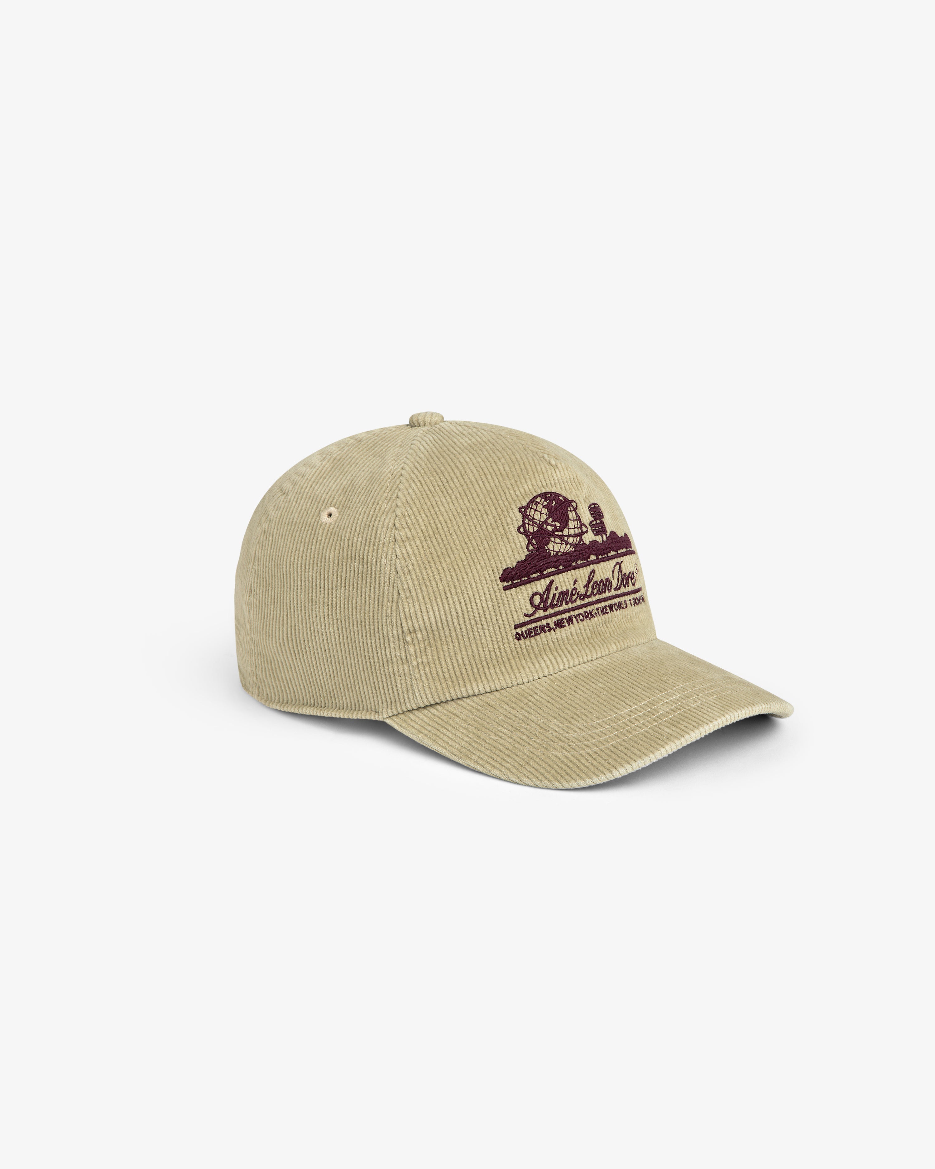 Tan Corduroy Unisphere Hat featuring a dark red globe graphic and text on the front.