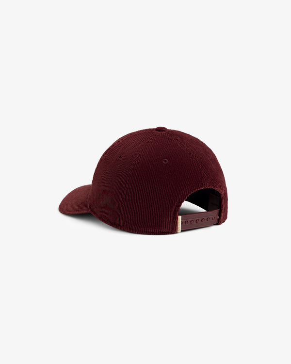 Back view of a dark red Corduroy Unisphere Hat with an adjustable snapback closure.