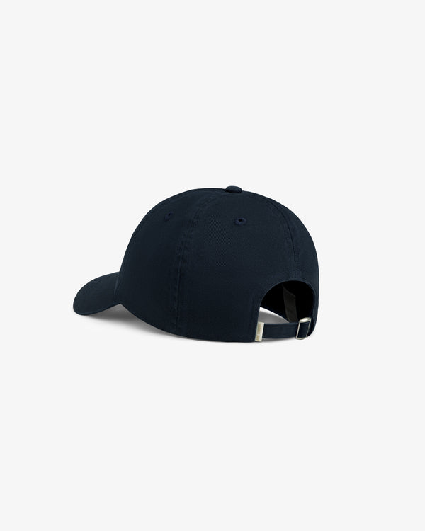 Aimé Souvenir Hat in navy blue, shown from the back with an adjustable strap and buckle.