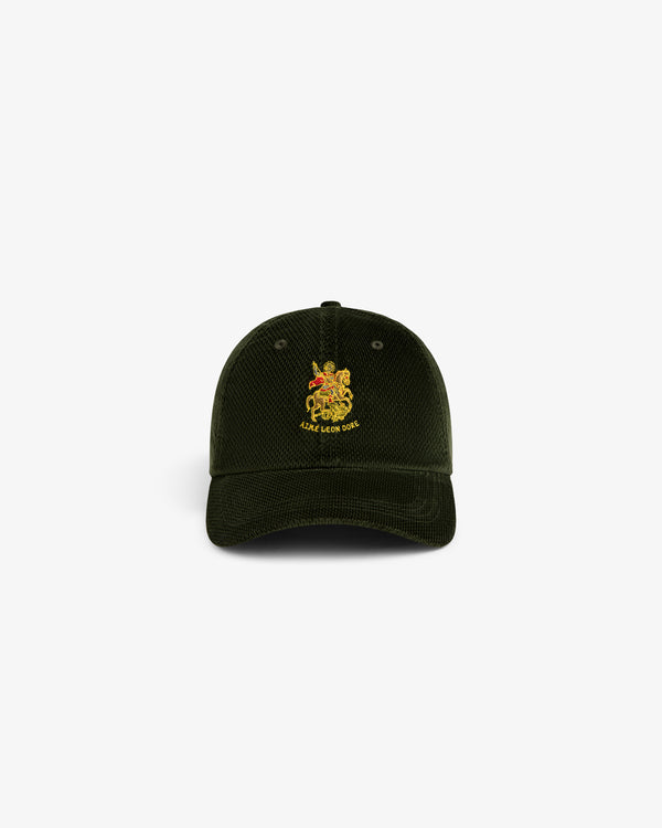 Saint George Corduroy Hat: Dark green corduroy cap with yellow crest and AUX LE BON GOÛT embroidered on the front.