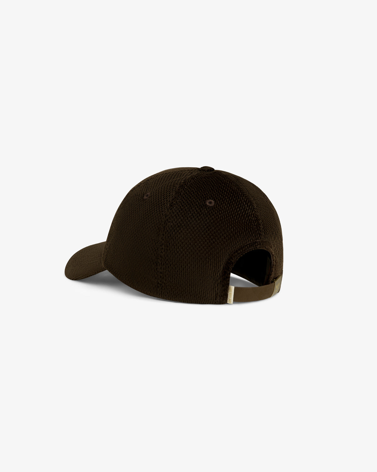 Saint George Corduroy Hat in brown, shown from the back with an adjustable strap and curved brim.