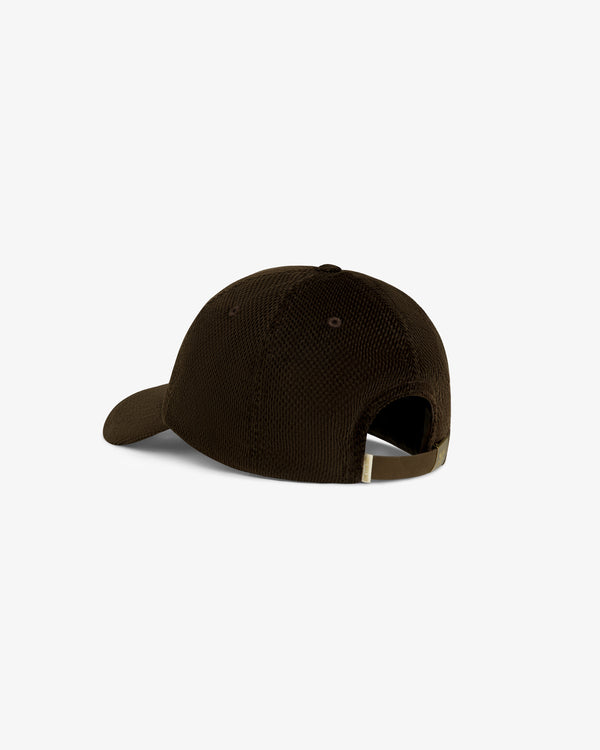 Saint George Corduroy Hat in brown, shown from the back with an adjustable strap and curved brim.