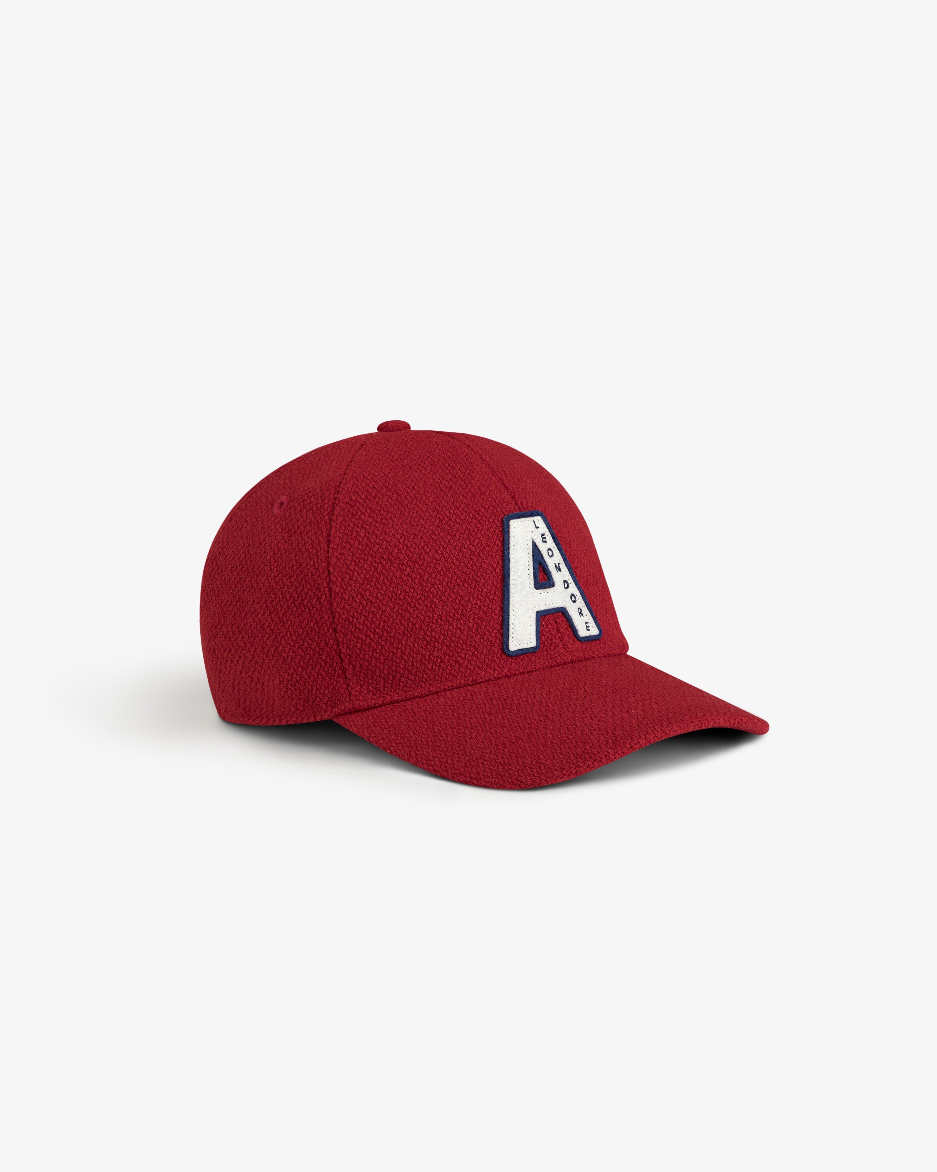 Wool Varsity Logo Hat in red with a white letter A patch and small blue text on the front.
