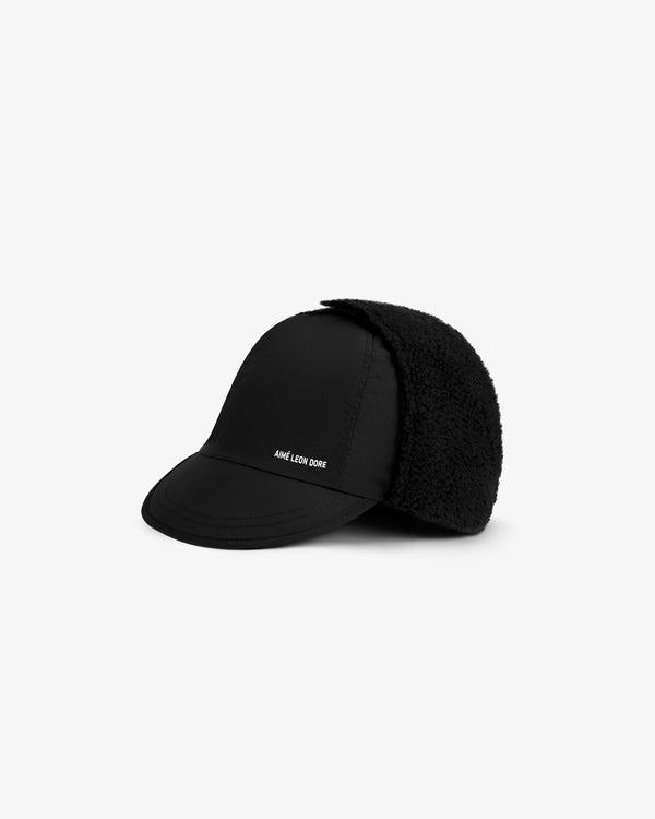 Black Fleece Lined Earflap Hat with a stiff brim and fuzzy earflaps featuring the Aimé Leon Dore logo.