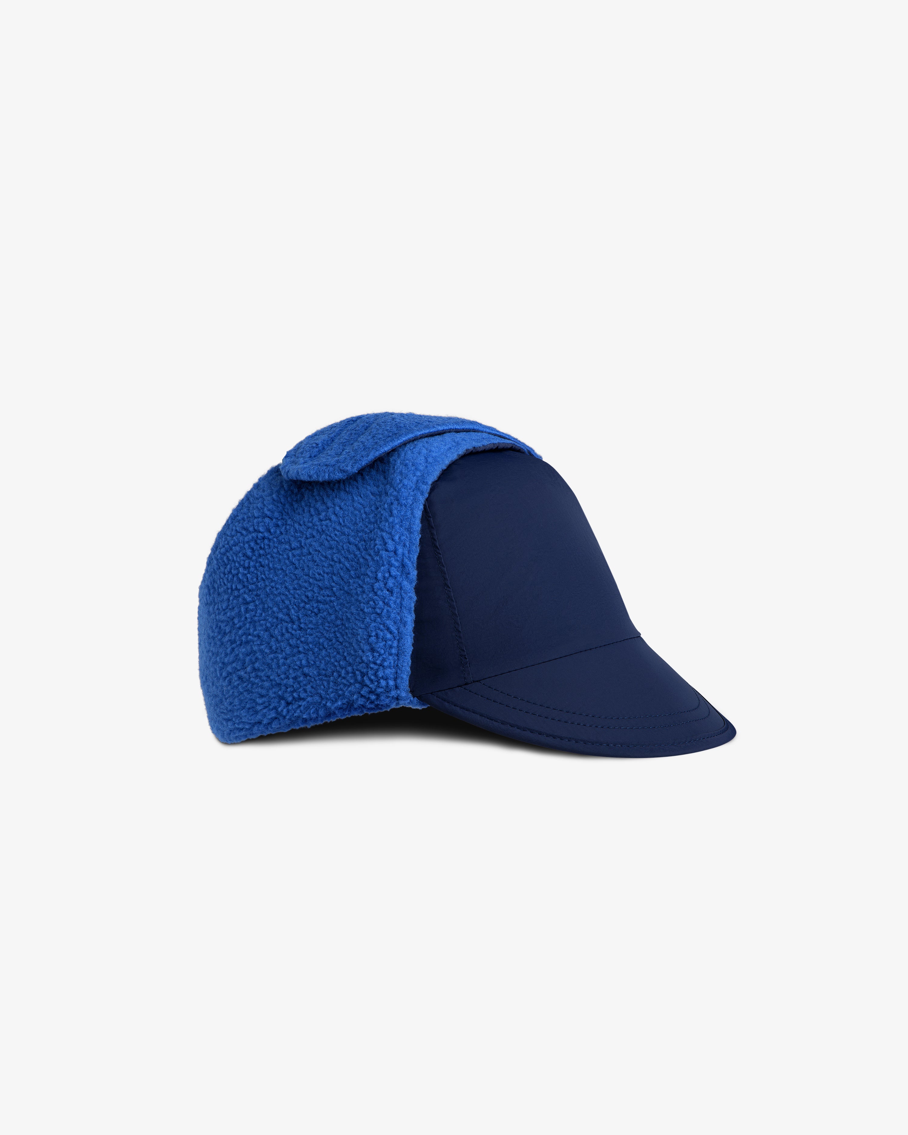 Fleece Lined Earflap Hat in blue with a navy brim and blue textured fleece earflaps.