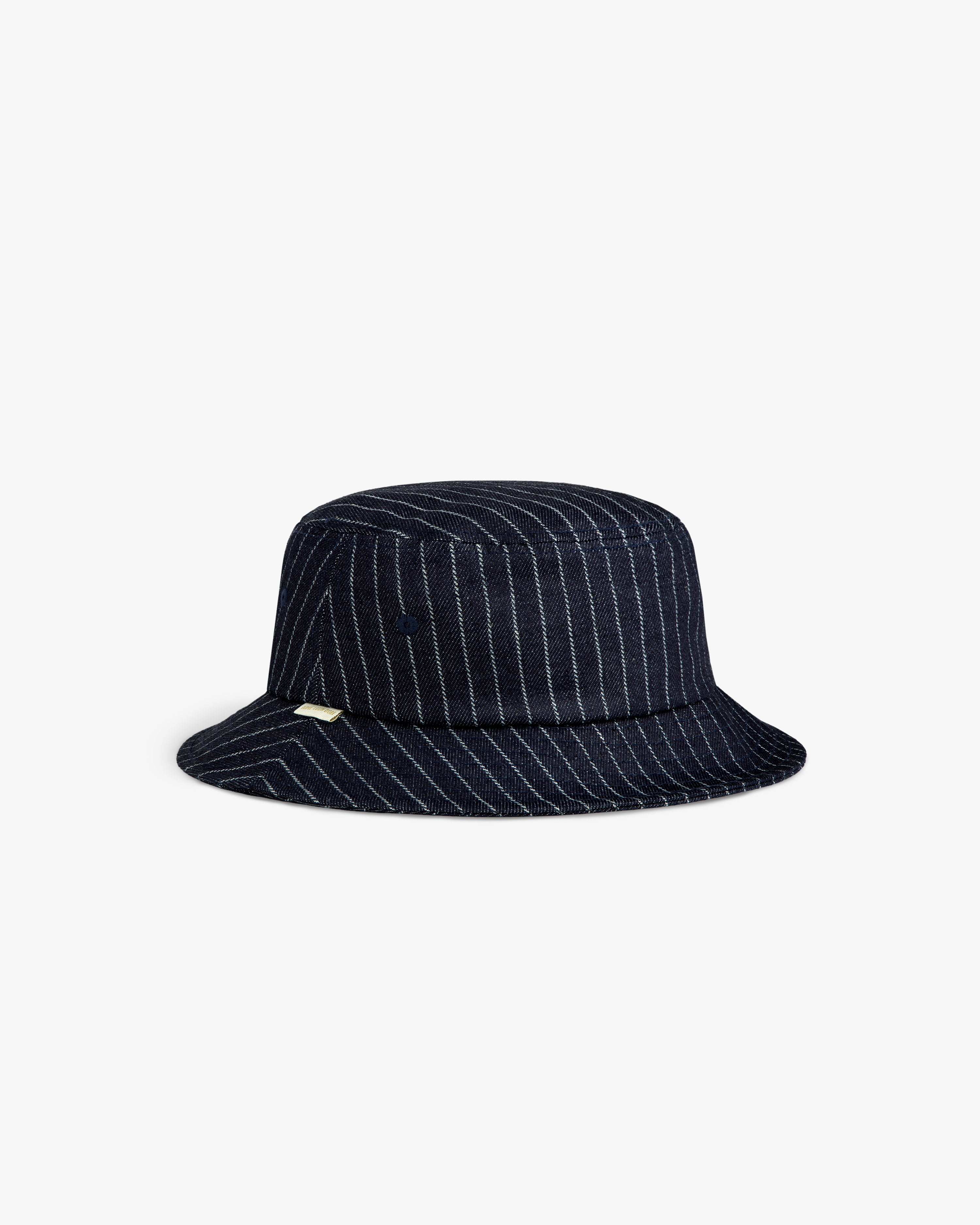 Chalk Stripe Bucket Hat in navy with white pinstripes and a beige tag, pictured on a plain white background.