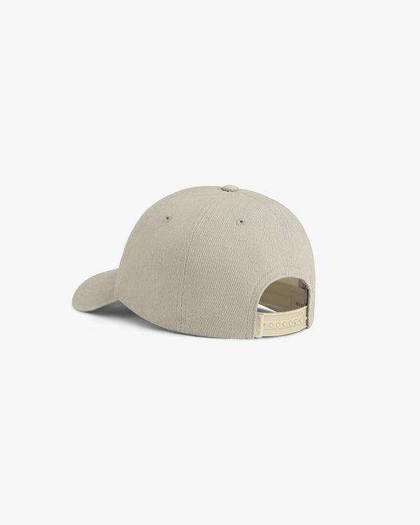 Back view of the Mulberry Letterman Hat in beige, featuring an adjustable strap and ventilation eyelets.