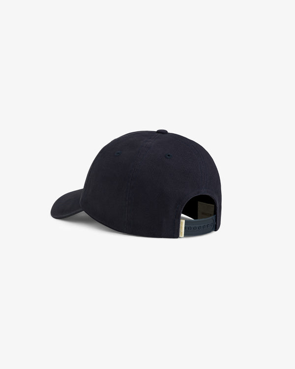 Mulberry Letterman Hat in navy, shown from the back, with an adjustable strap and a curved brim.