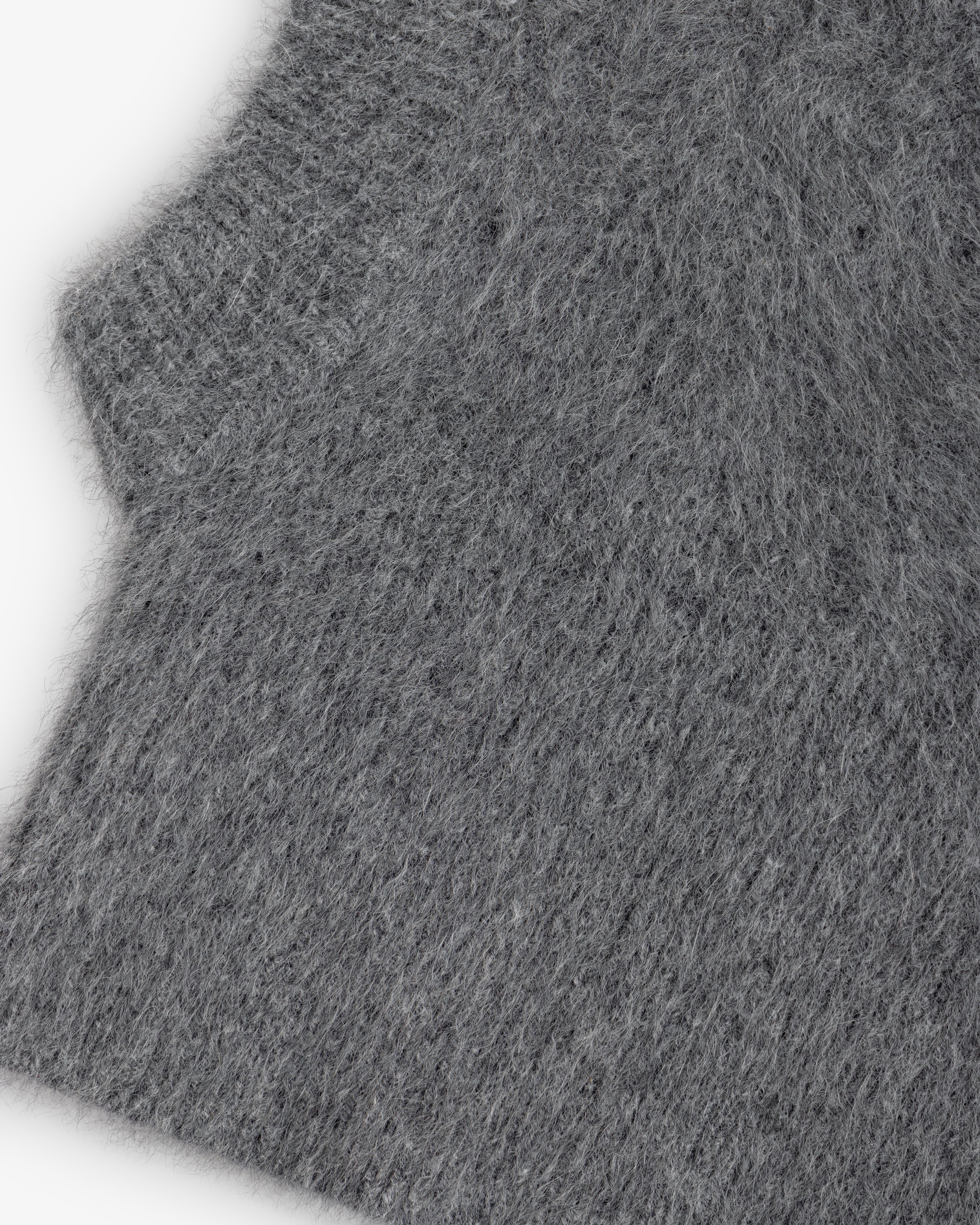 Close-up of a fuzzy gray Fox Fur Hood.