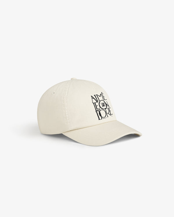 Cream Stacked Logo Hat with AIMÉ LEON DORE and small logo embroidered in black on the front.