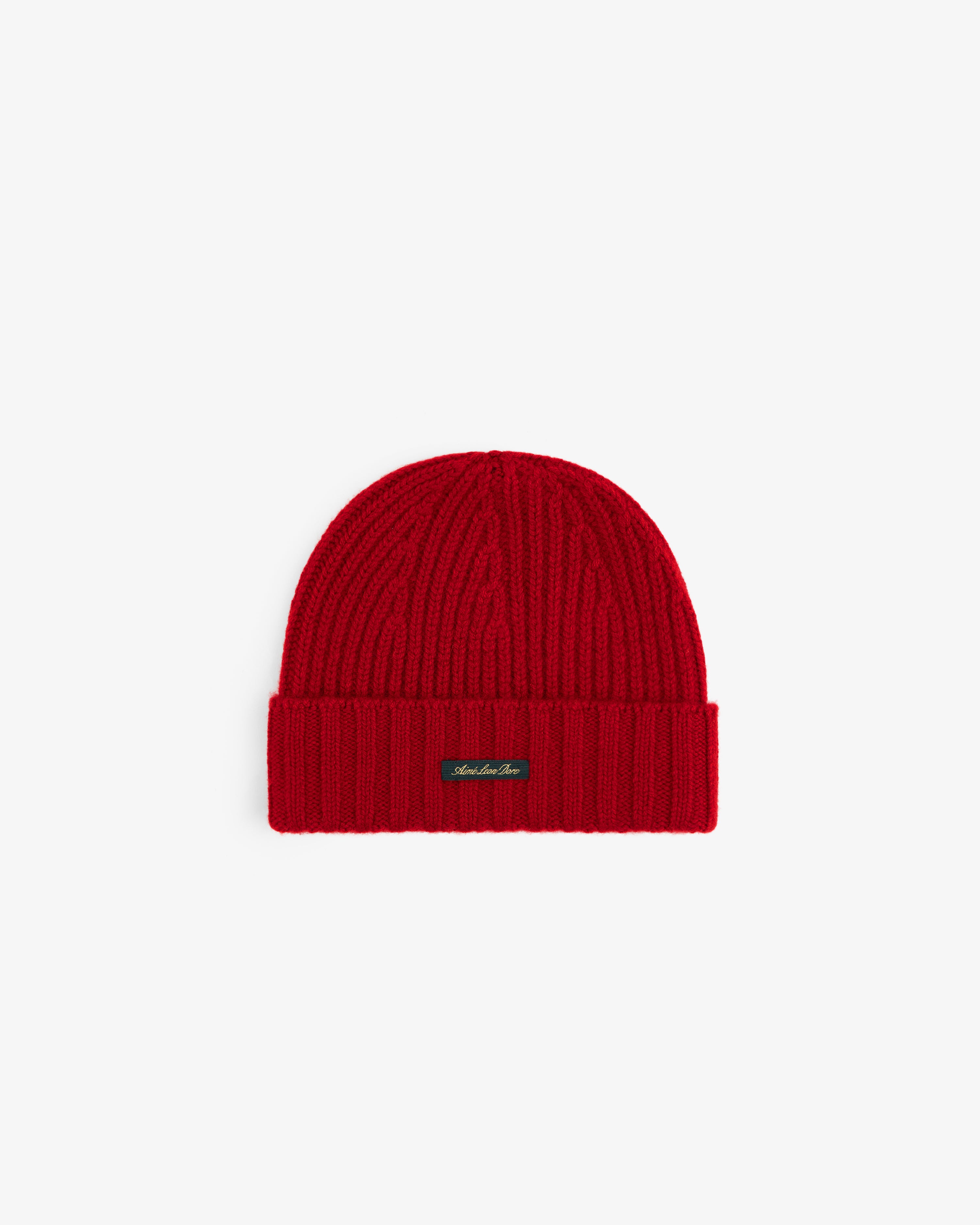 Red ribbed-knit Cashmere Beanie with a folded cuff and a small rectangular brand tag.