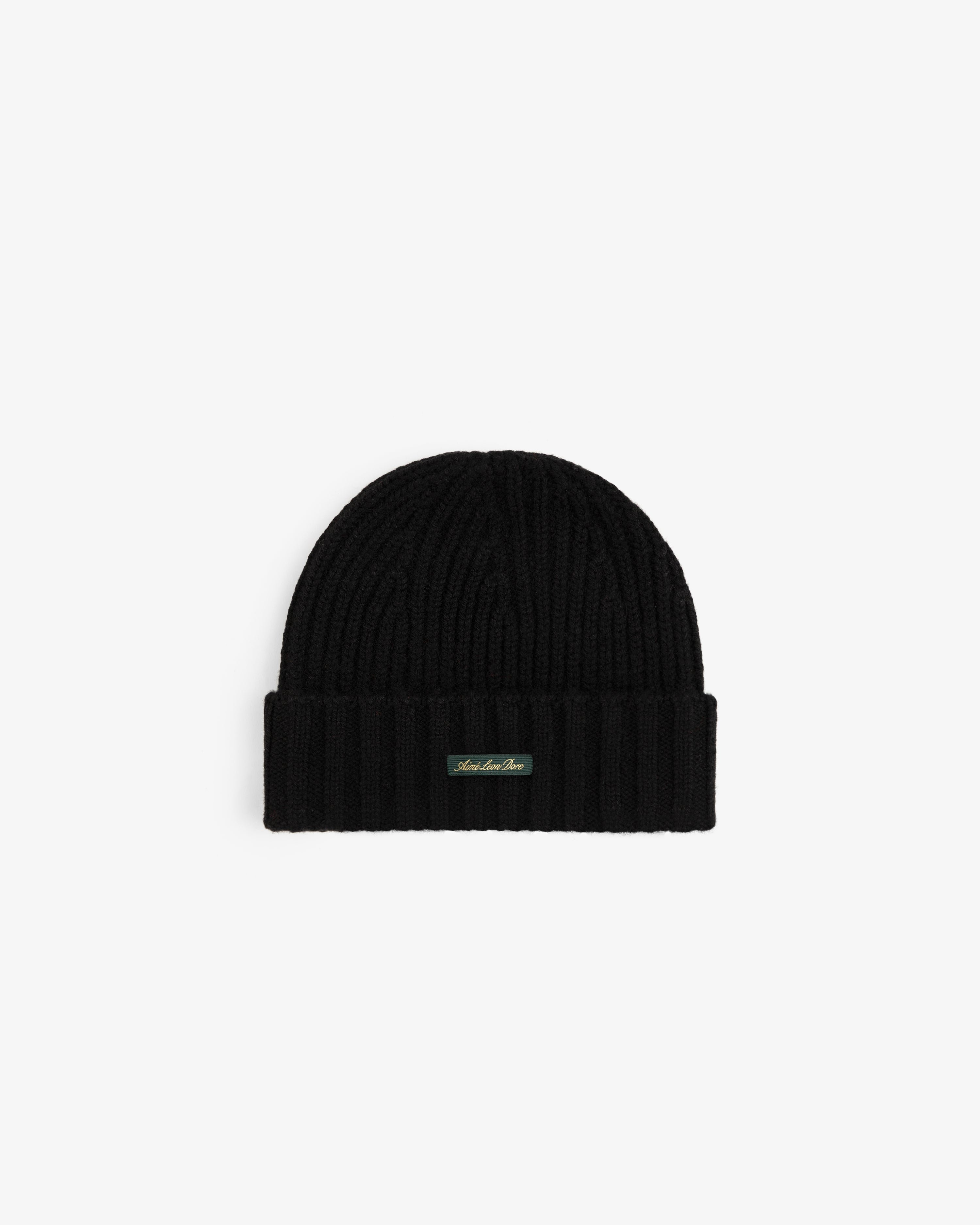 Black ribbed Cashmere Beanie with a small rectangular label on the cuff.