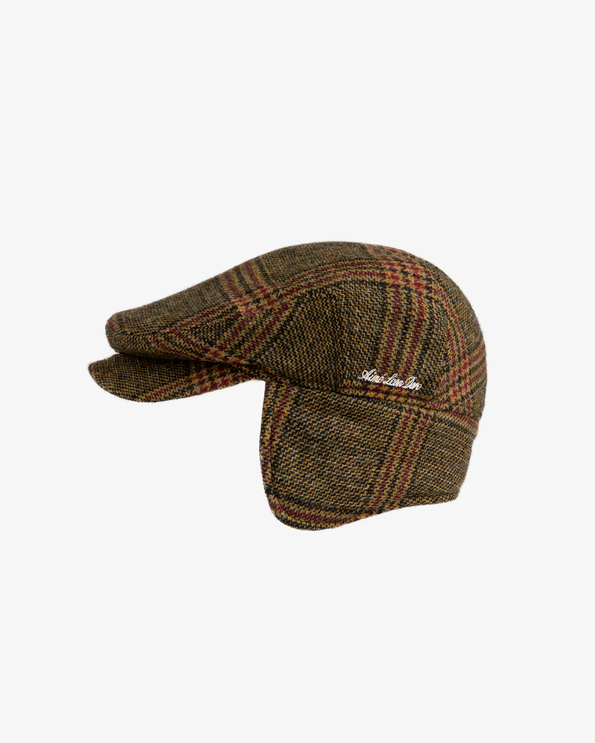 Brown plaid tweed Plaid Tweed Driver’s Hat with side flaps and embroidered white script.