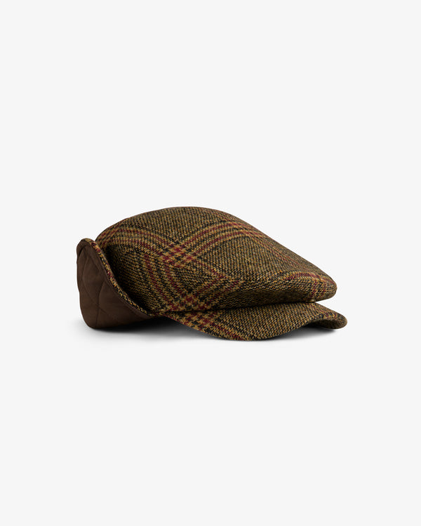 Brown plaid tweed Plaid Tweed Driver’s Hat with fold-down ear flaps.