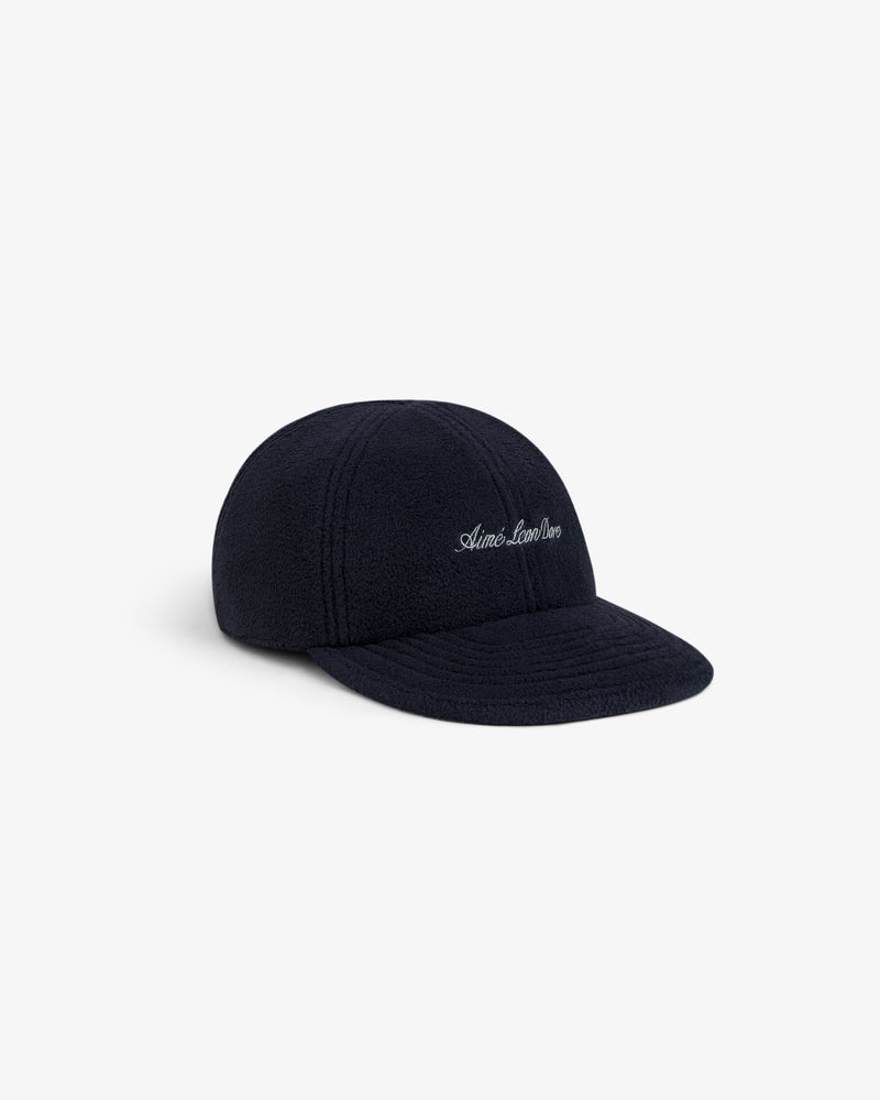 Navy blue Script Fleece Hat with white script embroidery on the front.