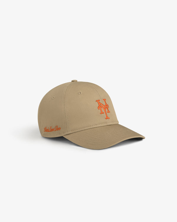 ALD / New Era Mets Ballpark Hat: beige cap with orange NY logo and orange script, shown on a white background.