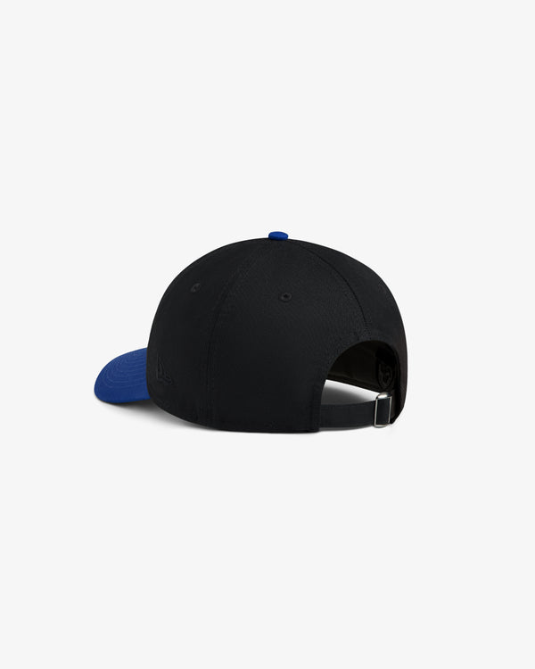 ALD / New Era Mets Ballpark Hat, black with blue brim, back view showing adjustable strap and metal buckle.