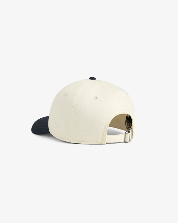ALD / New Era Yankees Ballpark Hat: cream cap with black brim, shown from back with adjustable strap and metal buckle.