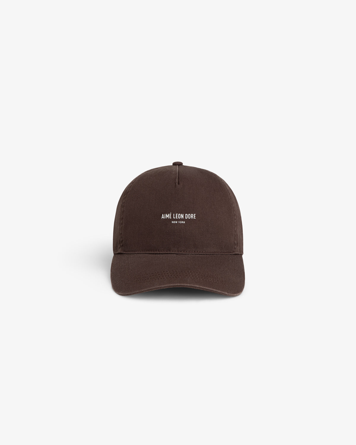 Brown Micro Logo Hat featuring AIMÉ LEON DORE NEW YORK text embroidered in white, centered on the front.