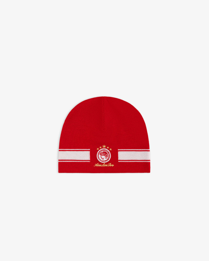 ALD / Olympiacos F.C. Stadium Beanie, a red beanie with a white horizontal stripe and a circular team crest in gold.