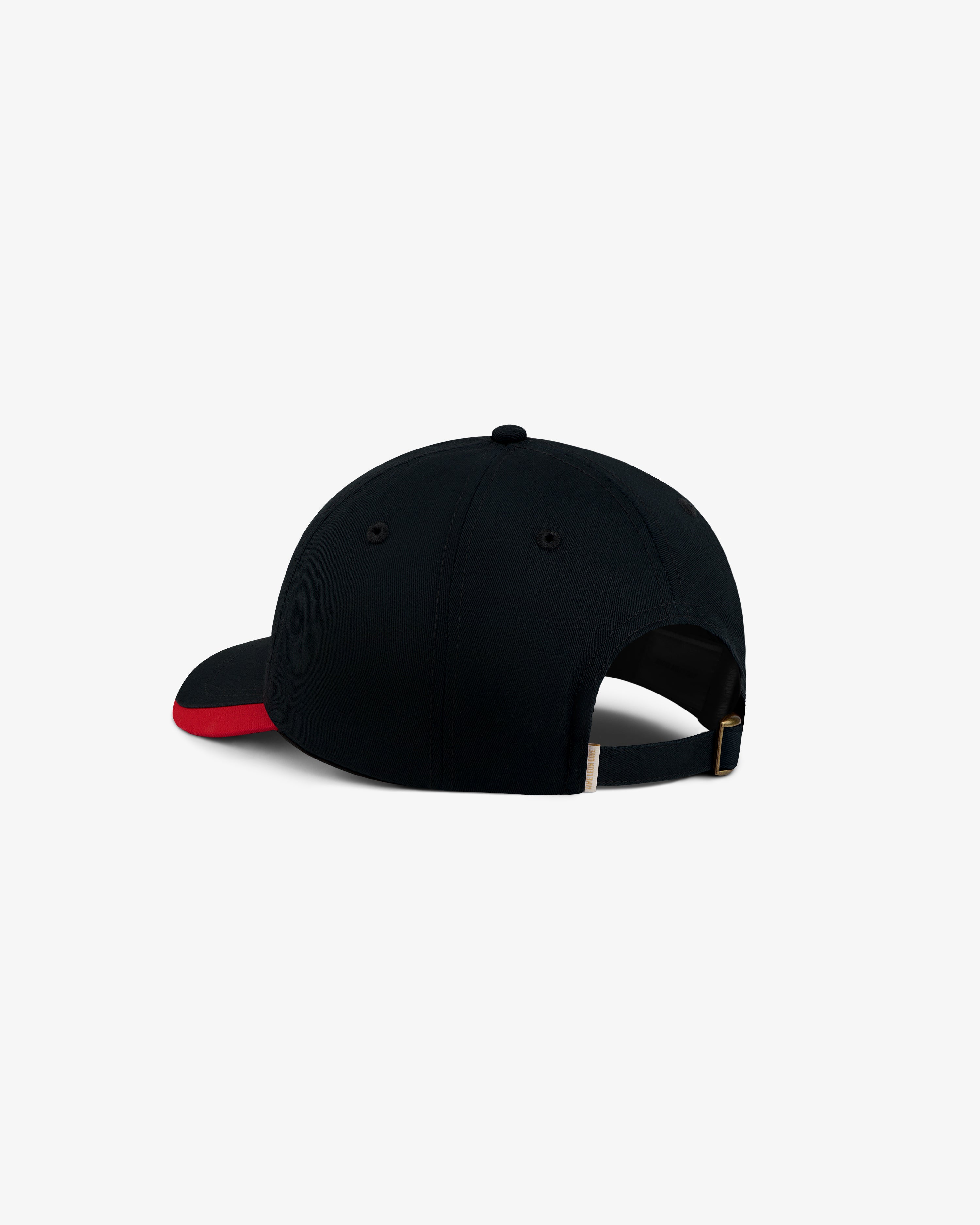 Back view of an ALD / Olympiacos F.C. Souvenir Hat, a black baseball cap with a red brim and adjustable gold-tone strap.