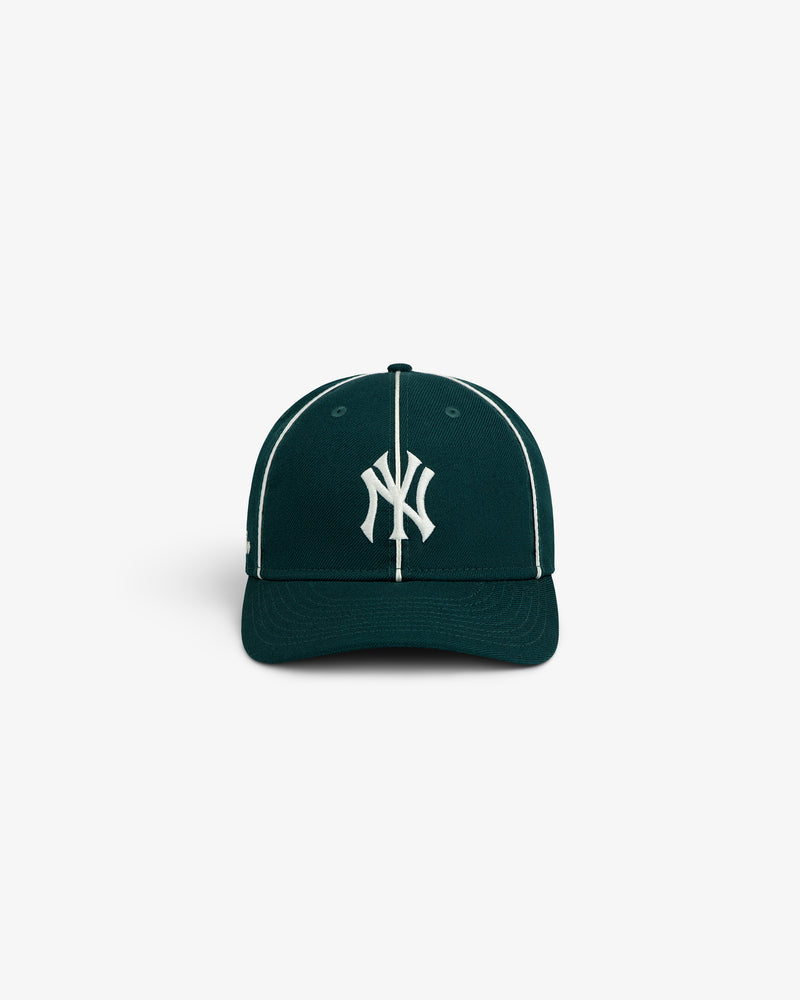 ALD / New Era Yankees Wool Hat, a dark green baseball cap with a white Yankees logo and white pinstripe details.