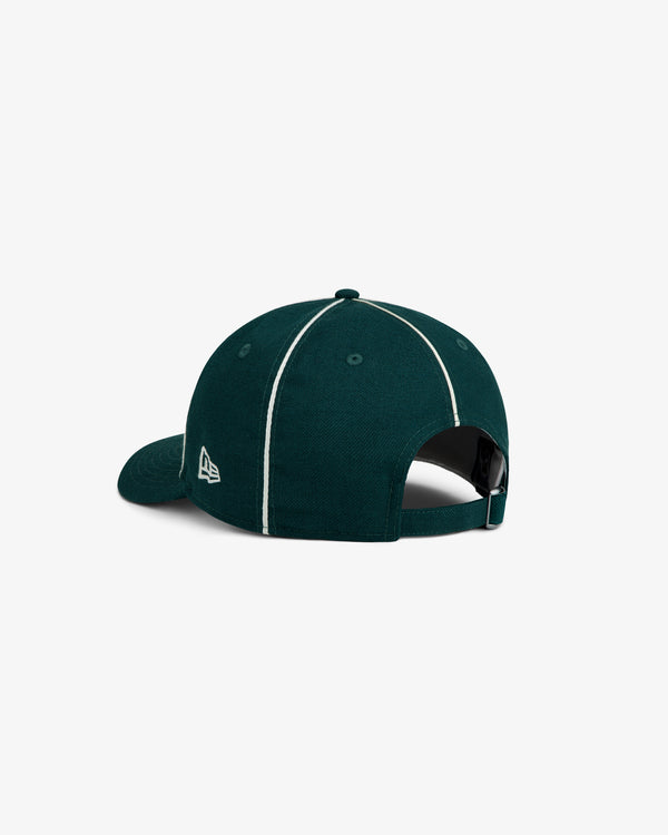 Dark green ALD / New Era Yankees Wool Hat with white piping and an adjustable strap back.