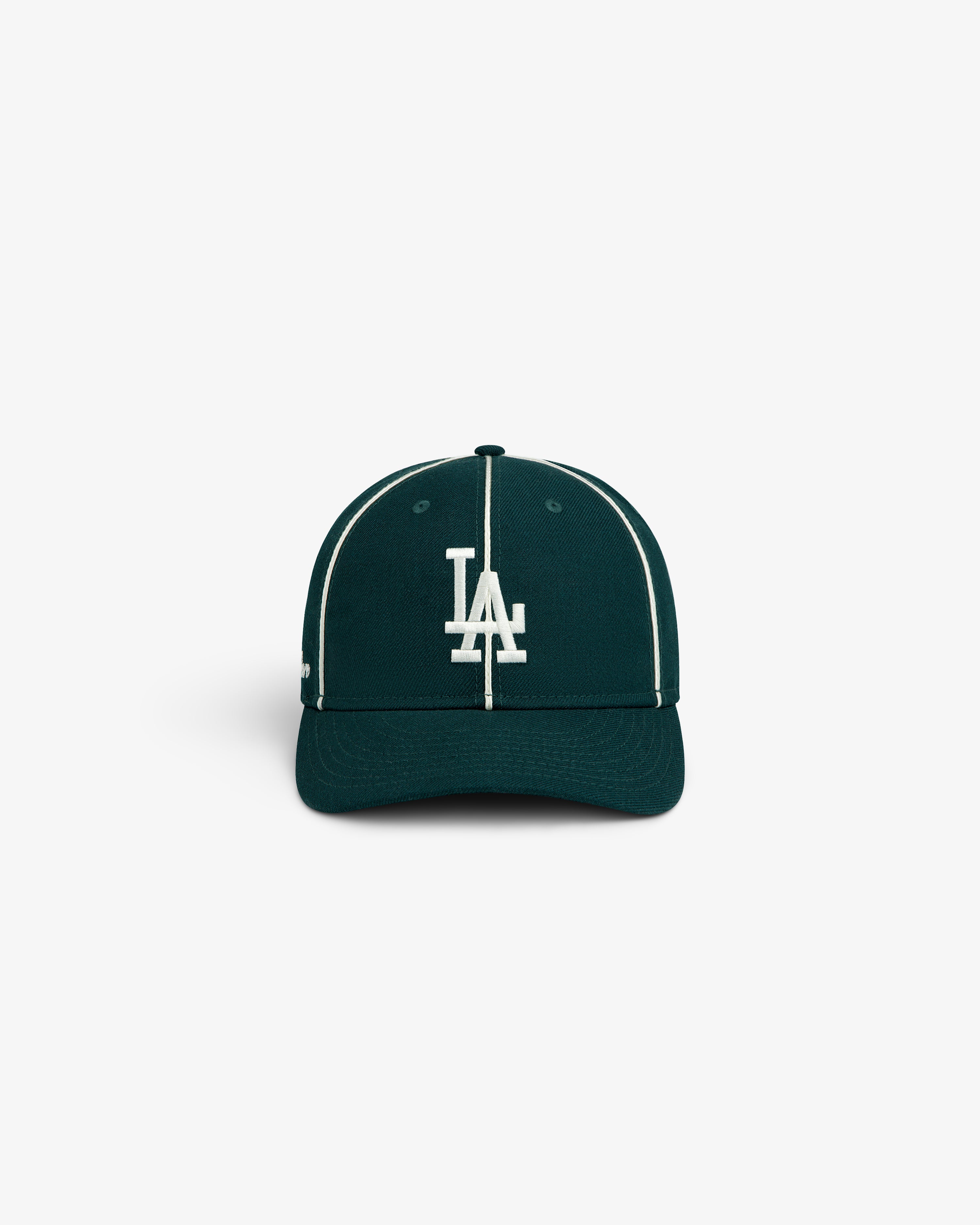 ALD / New Era Dodgers Wool Hat in dark green with a white LA logo and white piping along the crown seams.