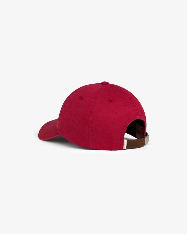 Crest Logo Hat in red, shown from the back with adjustable strap and metal clasp.