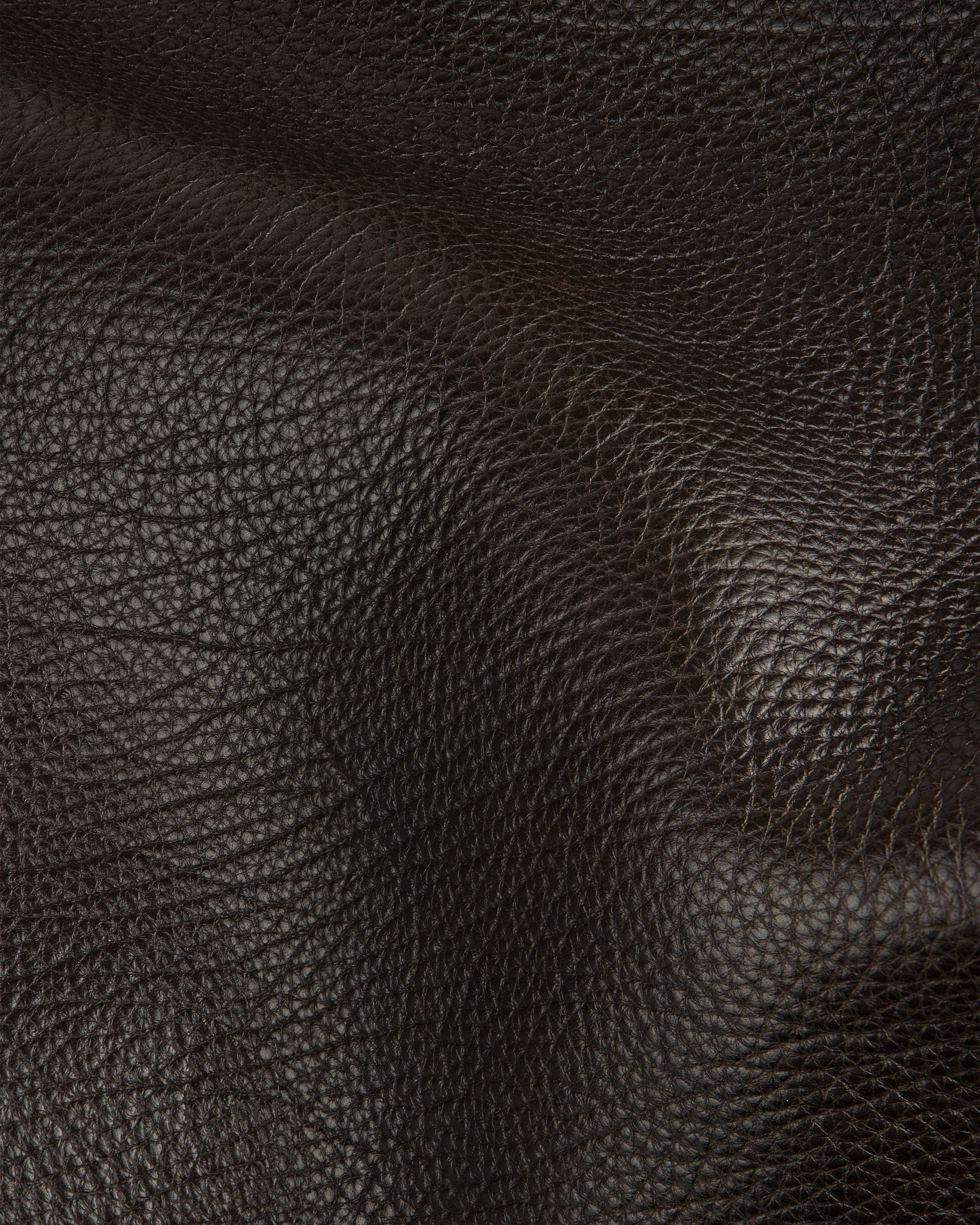 Close-up of tumbled leather on the Tote Bag, highlighting its rich texture, visible grain, and natural creases.