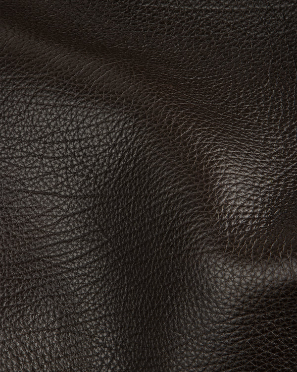 Close-up of tumbled leather on the Tote Bag, highlighting its rich texture, visible grain, and natural creases.