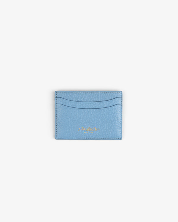 Tumbled Leather Card Holder in light blue with two slots and gold text, shown on a white background.