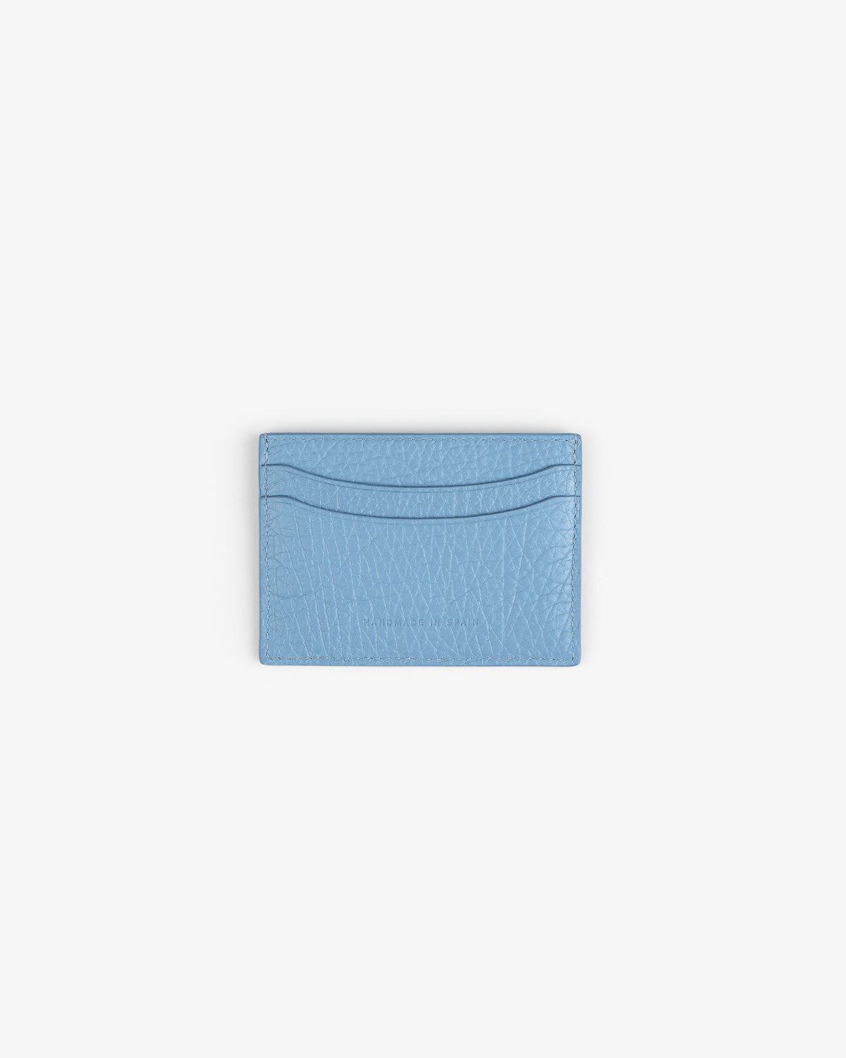 Tumbled Leather Card Holder in light blue leather with two slots, displayed on a plain white background.