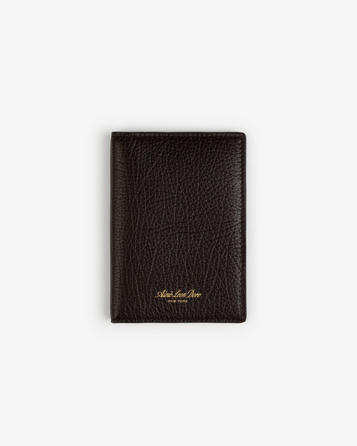 A black Tumbled Leather Passport Holder with gold lettering, shown closed on a plain white background.