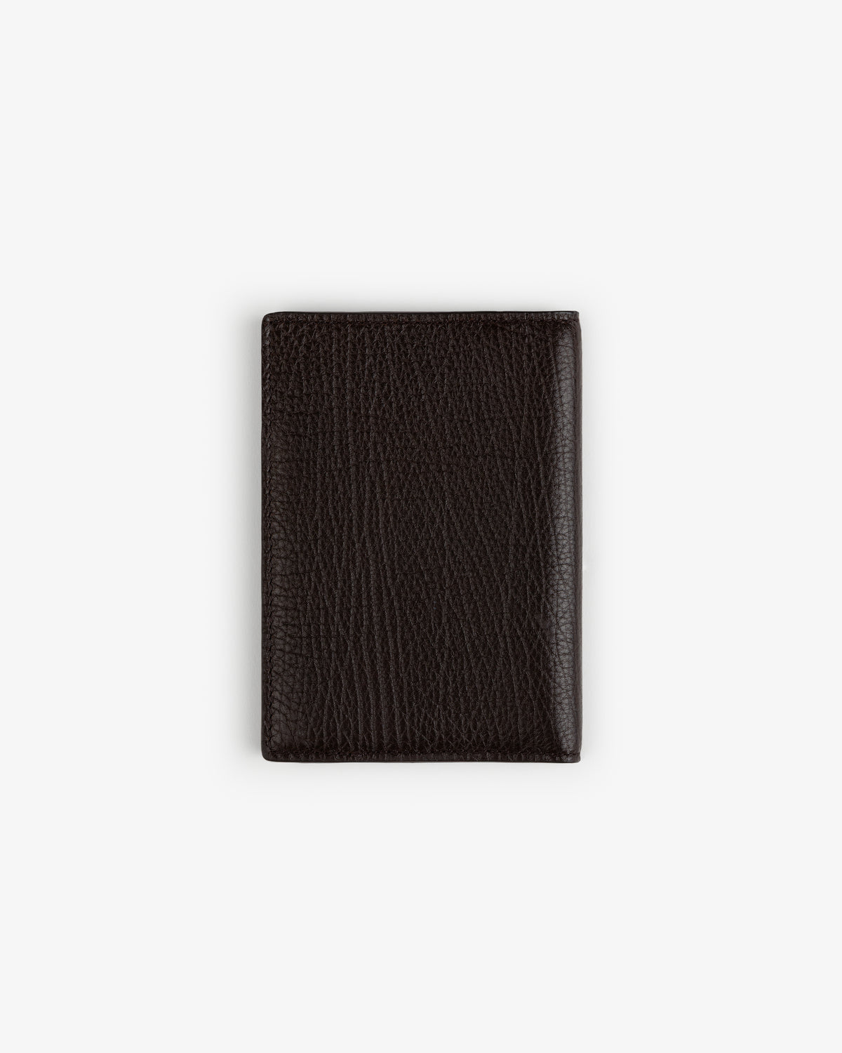 Tumbled Leather Passport Holder in dark brown, pebbled finish, shown closed on a plain white background.