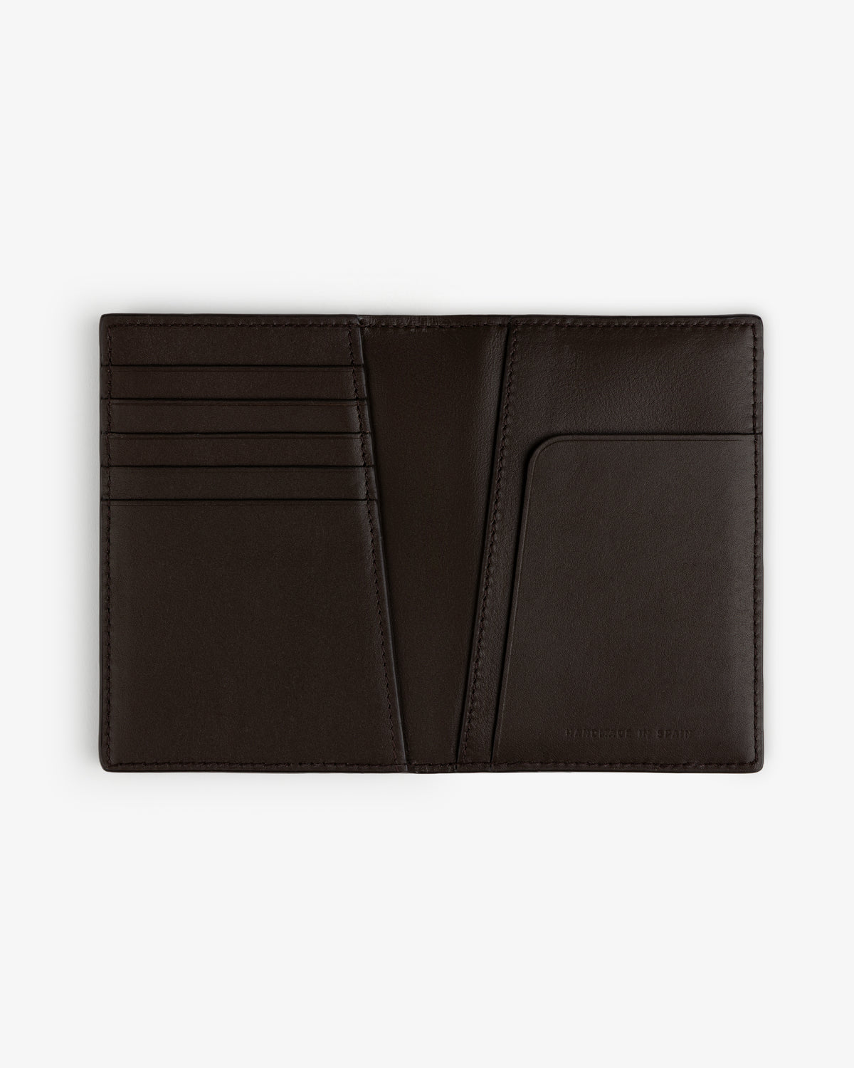 Tumbled Leather Passport Holder in black, open to show card slots and pocket, displayed flat on a white background.