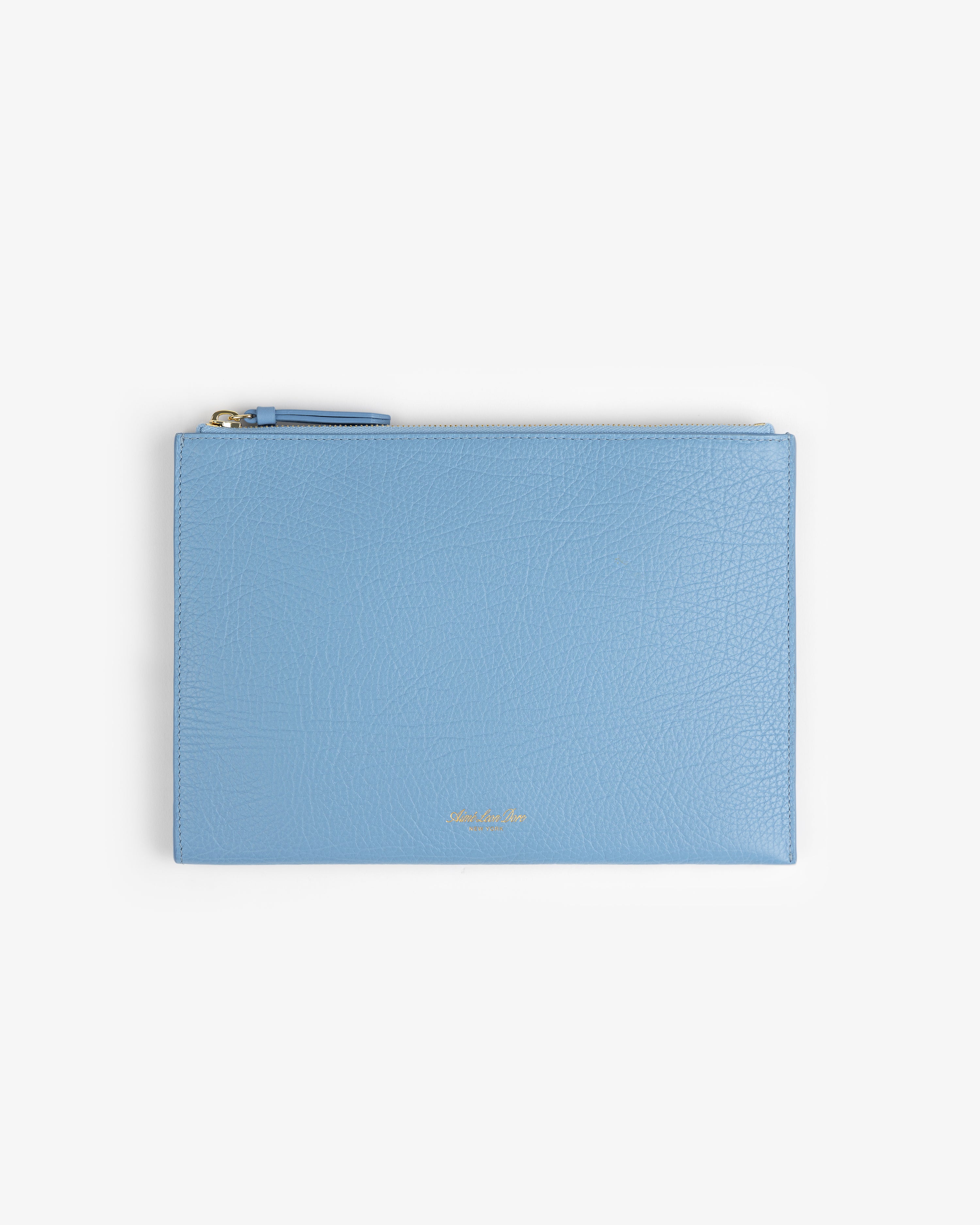 Small Tumbled Leather Pouch in light blue, rectangular with top zipper and gold text near bottom center.