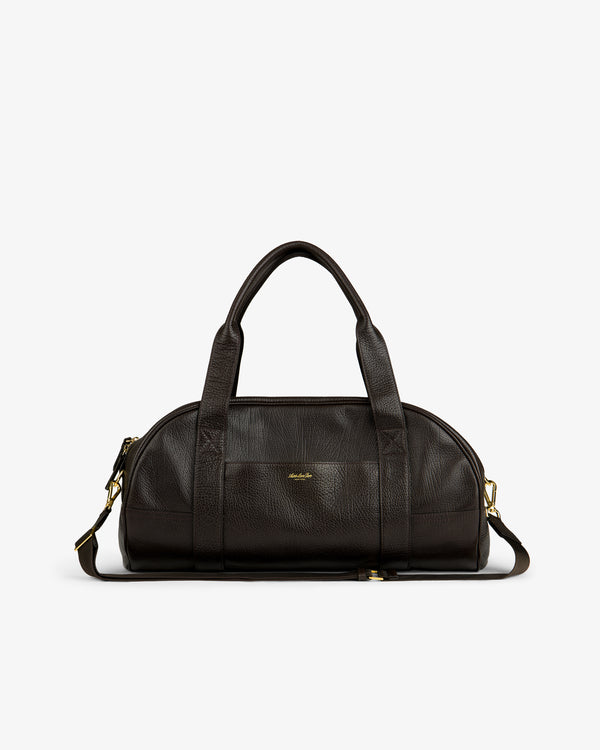 Tumbled Leather Duffle in dark brown with handles, shoulder strap, and gold hardware on a white background.