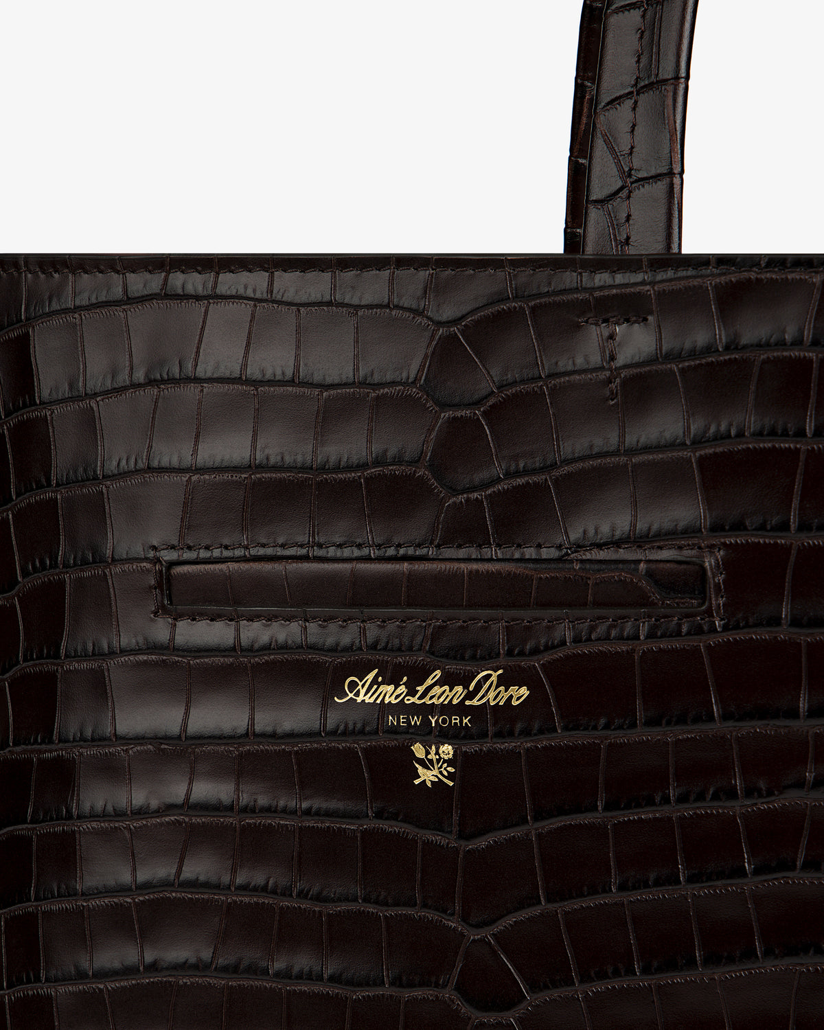 Dark brown croc-embossed leather Croc-Embossed Leather Shoulder Bag with gold logo text and a small flower emblem.