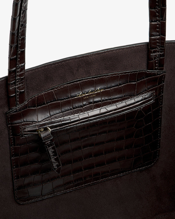 Interior view of a dark brown Croc-Embossed Leather Shoulder Bag with an attached zippered pocket.