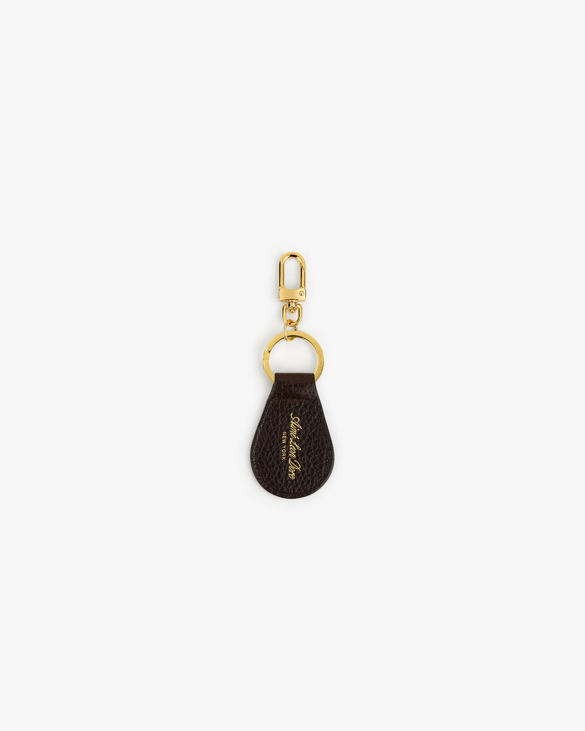 Tumbled Leather Key Fob with gold hardware and a small gold signature detail on brown leather.