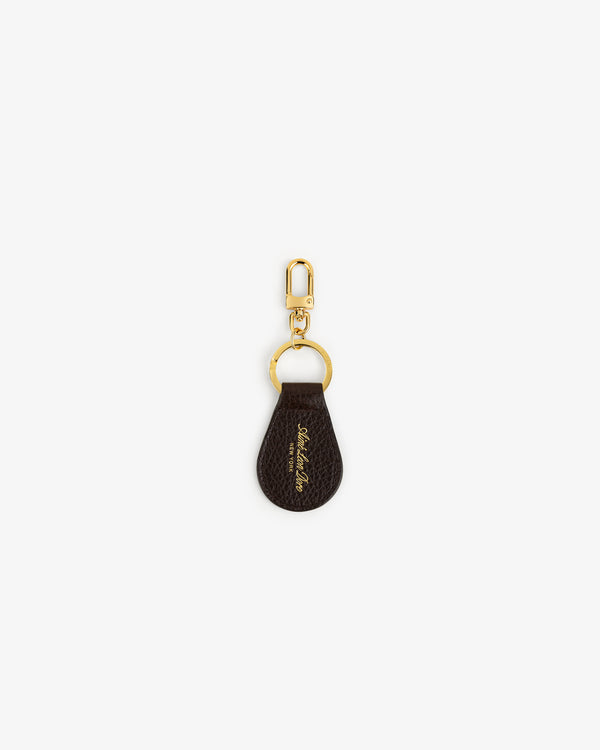 Tumbled Leather Key Fob with gold hardware and a small gold signature detail on brown leather.
